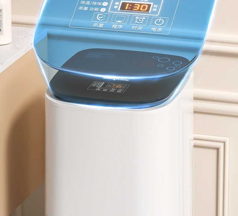 Tidesmit 60L automatic clothes dryer with baby disinfection and air-drying features for compact laundry care