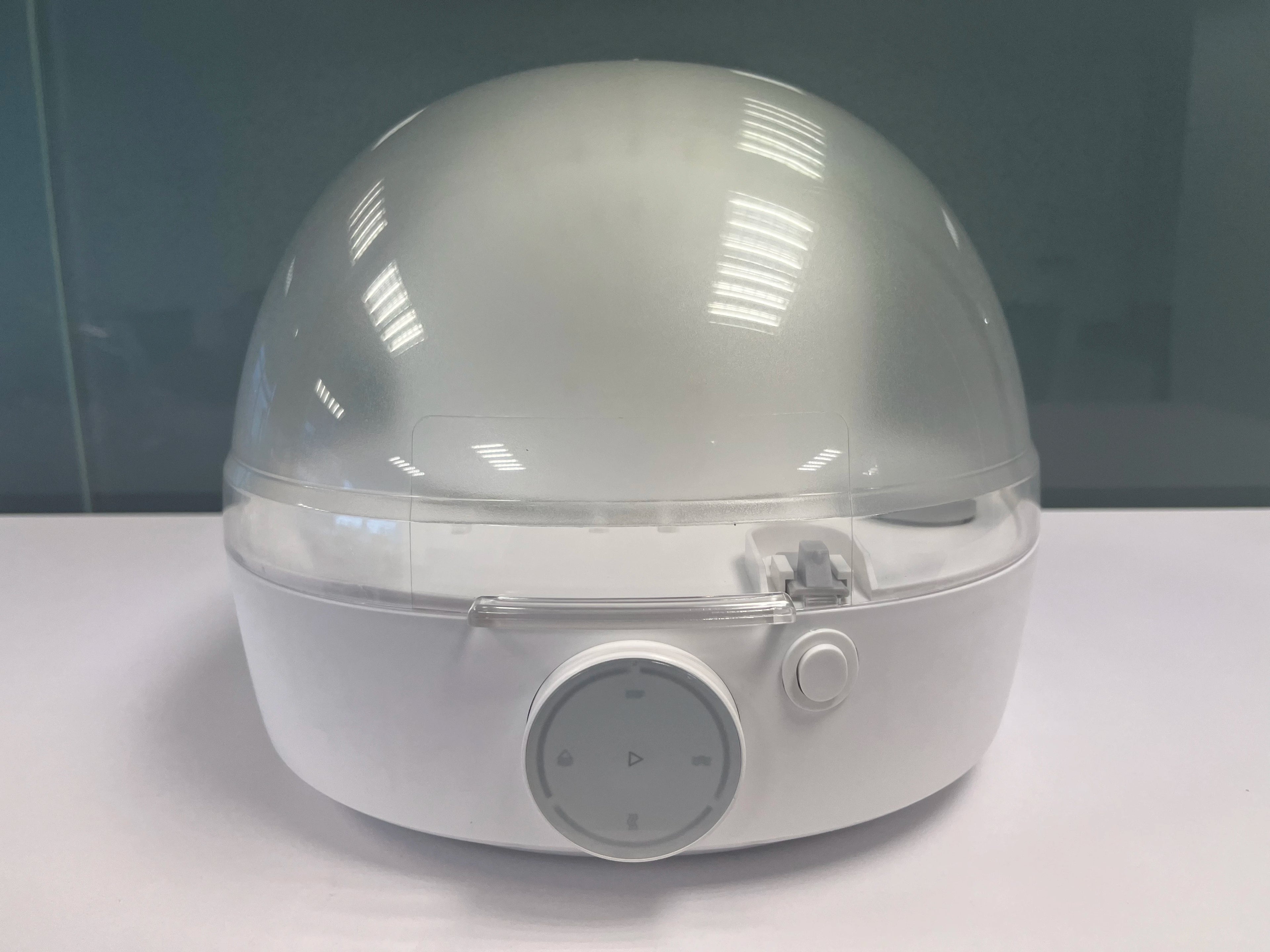 Tidesmit automatic cap cleaner featuring steam cleaning, ironing, and drying for baseball caps and bucket hats.