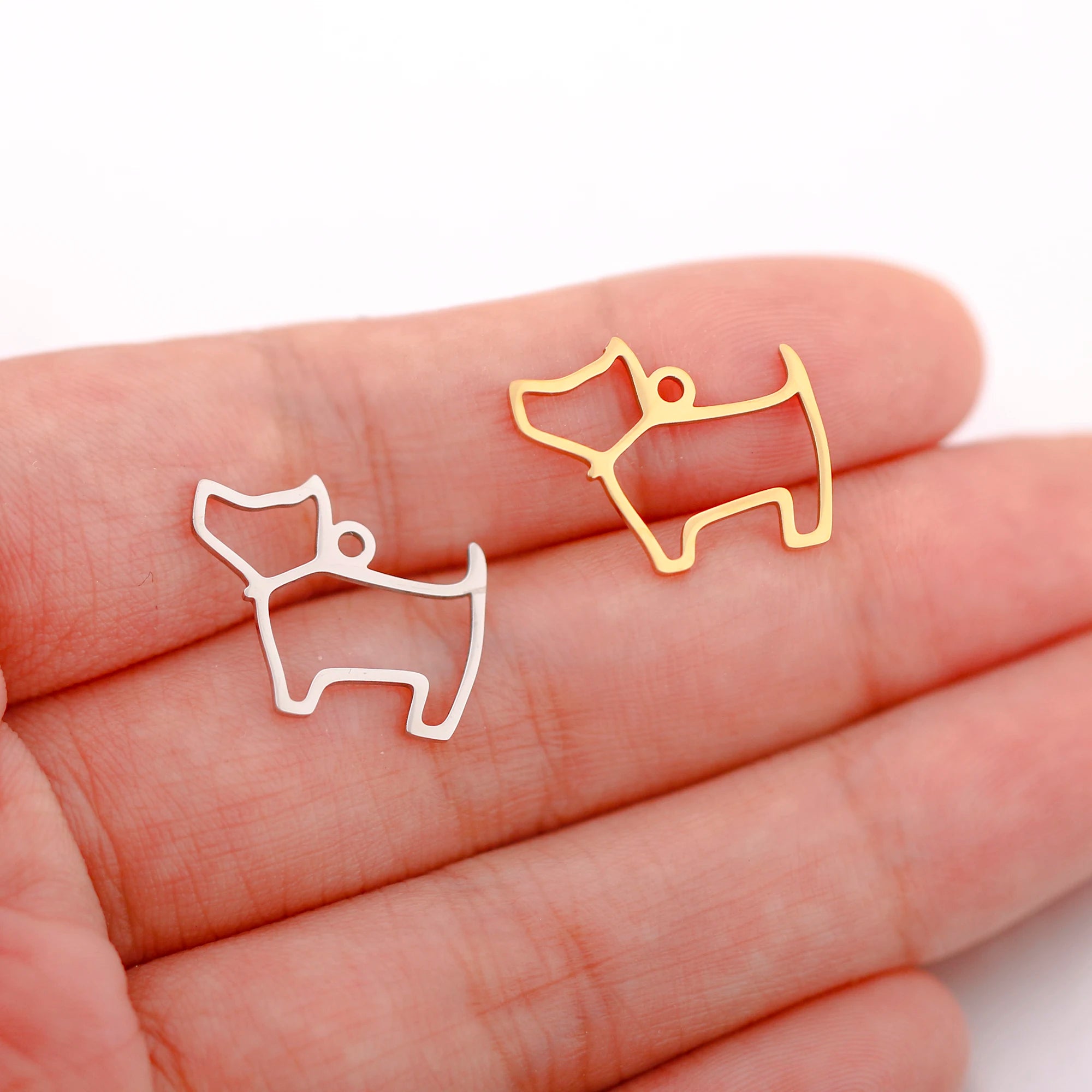 Gold and silver stainless steel balloon dog charms for DIY jewelry making, perfect for necklaces and bracelets.