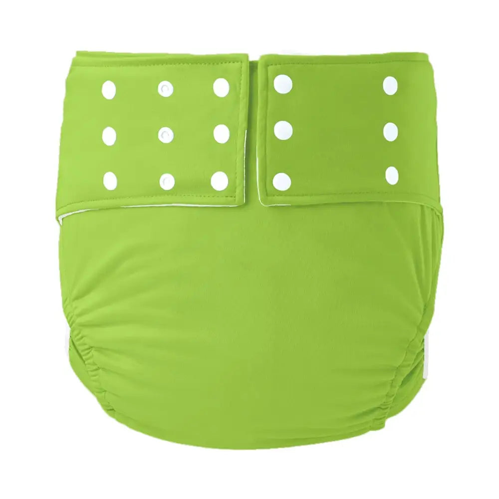 Green adjustable reusable cloth diaper for babies with white snap buttons.