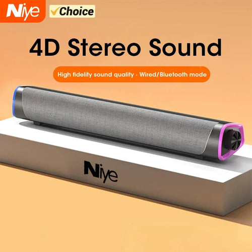 Computer speaker bar with gray fabric grille and purple end bass port, single long unit
