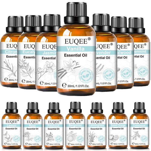 Set of amber glass bottles of EUQEE essential oil for aromatherapy wellness, featuring various plant scents.