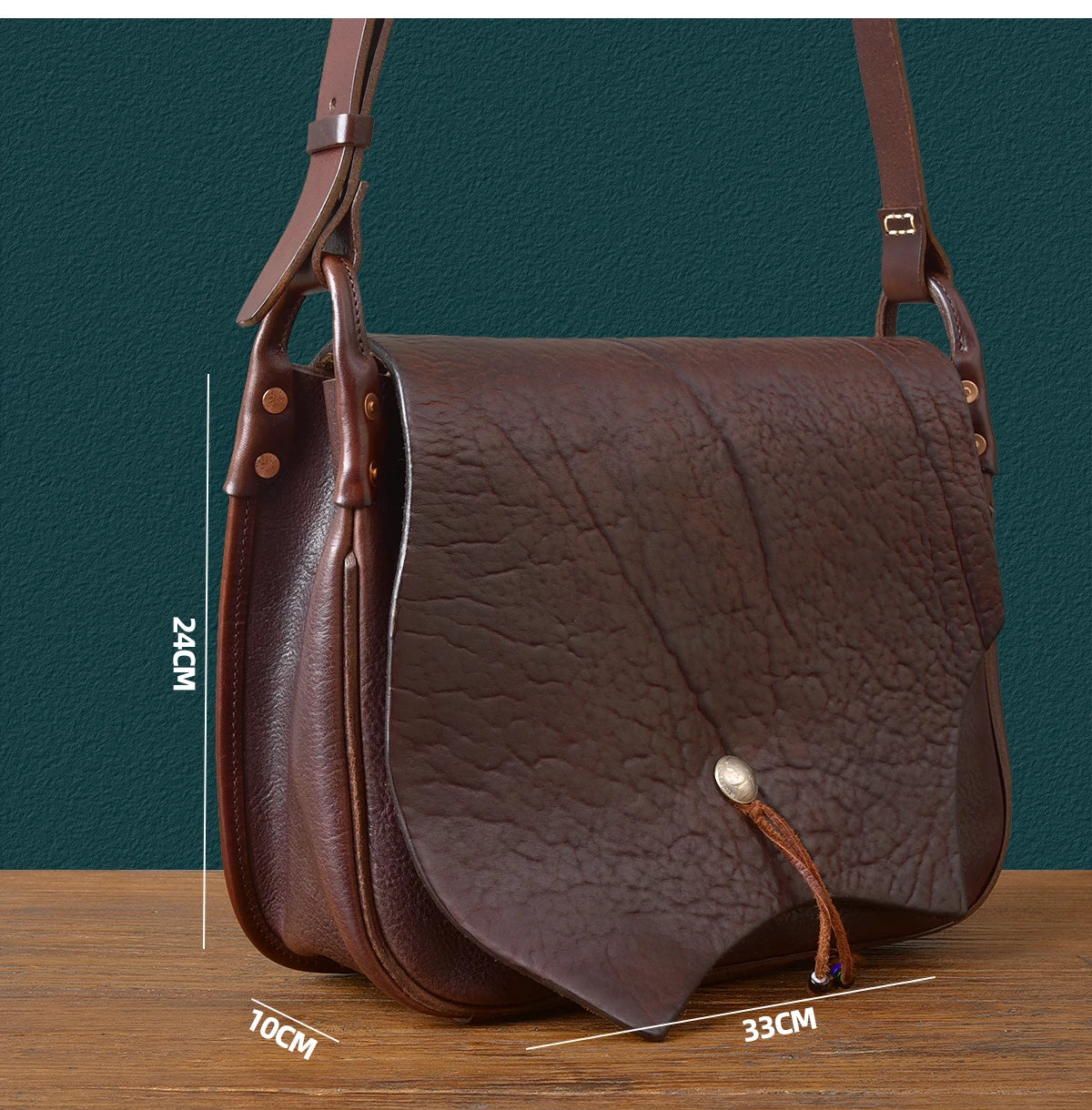 PNDME vintage dark brown cowhide messenger bag, handmade genuine leather shoulder bag with a unique rivet clasp design.