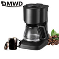 MWD black drip coffee maker with glass carafe, compact design, and matching travel mug with coffee beans.