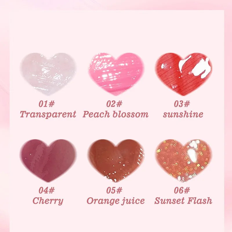 6-piece set of moisturizing lip gloss oils in heart-shaped swatches with sheer, tinted, and glitter finishes.