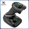 Black handheld 2D barcode scanner with green indicator lights and charging base