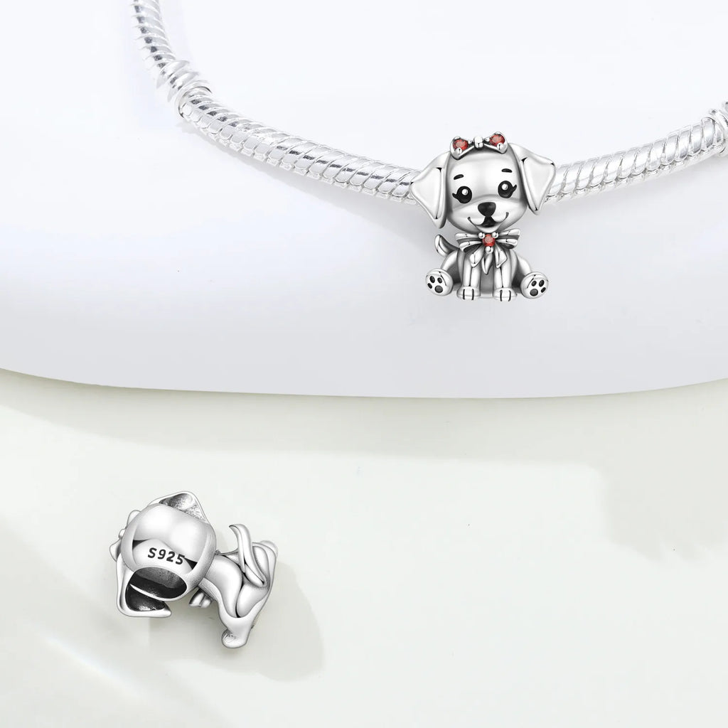 925 sterling silver dog charm with red bow for DIY bracelets, a cute pet jewelry gift for animal lovers.