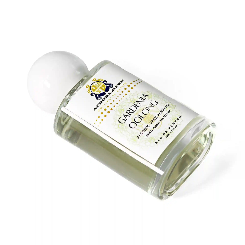 Aurora-Glen Gardenia Oolong Eau de Parfum in a cylindrical glass bottle with white cap. Floral tea essential oil.