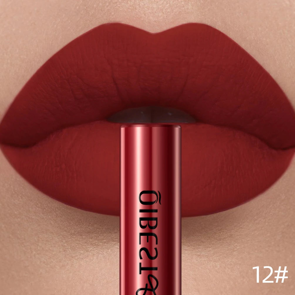 Close-up of lips wearing long-lasting waterproof matte red liquid lipstick in shade 12 with a velvet finish.