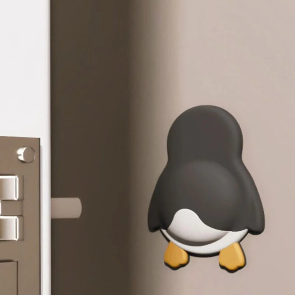 3D penguin self-adhesive door stopper for wall protection against door handles. Cute silicone anti-collision bumper.