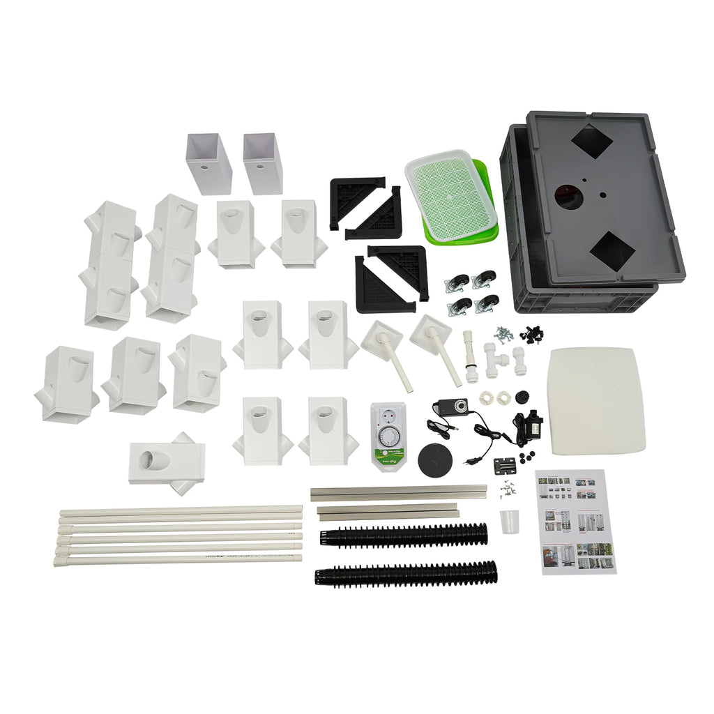 Hydroponic growing tower parts kit with white pieces, black equipment, tubing and fittings