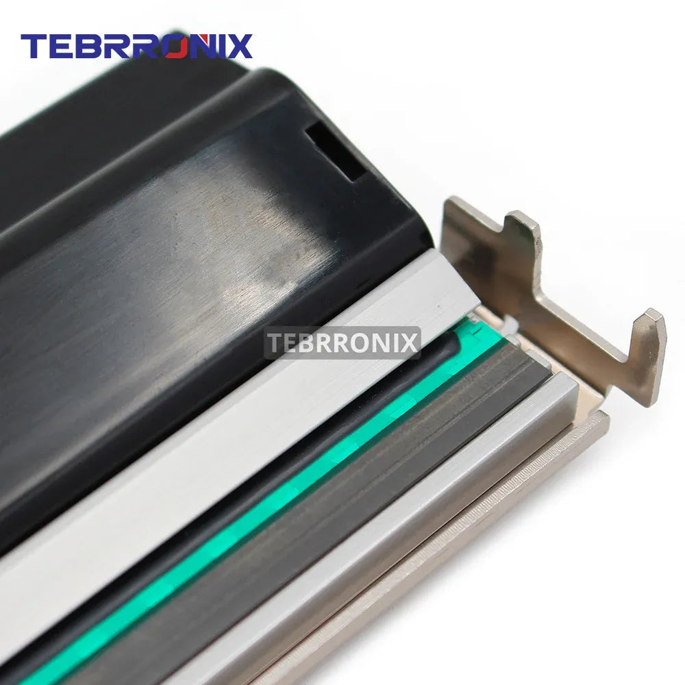 Printhead close-up showing black cover and turquoise ribbon strip