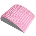 Pink arched back stretcher with textured massage nodes for spinal decompression and lumbar support.