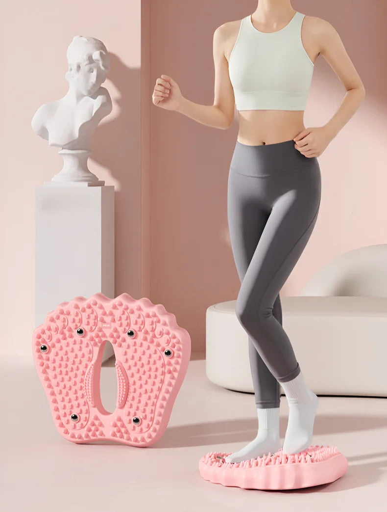 Pink foot-shaped acupoint massage mat with magnetic accents and textured surface for non-slip stimulation.