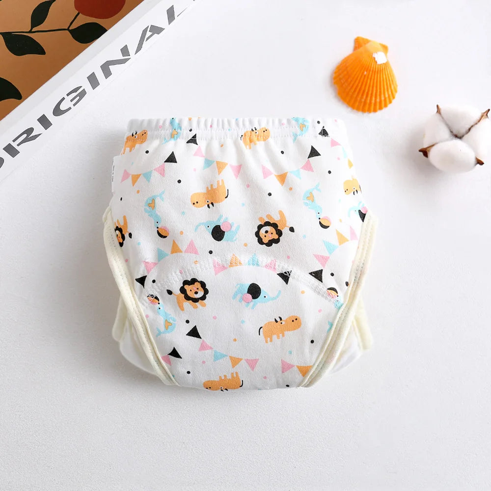 Reusable baby training diaper featuring a cute animal lion and elephant print on white cotton.