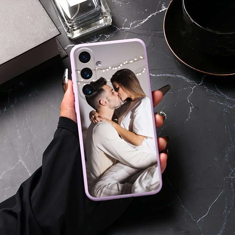 Lavender custom phone case featuring a couple kissing, with cutouts for triple camera lenses.