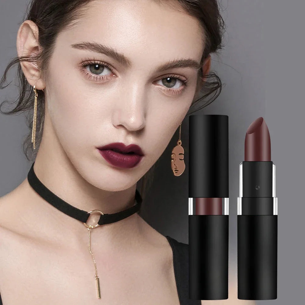 Model wearing dark wine red matte lipstick with long-lasting waterproof formula in sleek black packaging.