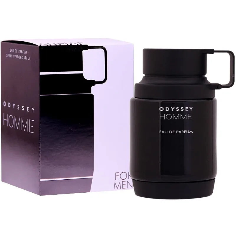 Armaf Odyssey Homme Eau de Parfum: Black cylindrical bottle with loop cap, woody men's fragrance in box.