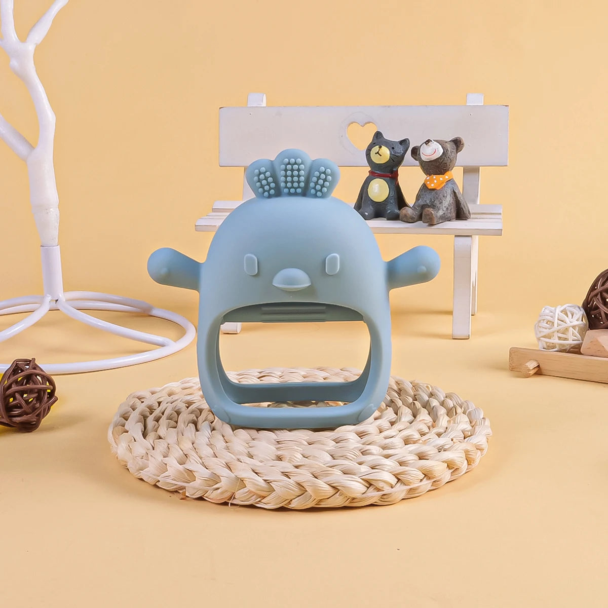 Blue silicone baby teething toy for pain relief and soothing gum massage.
