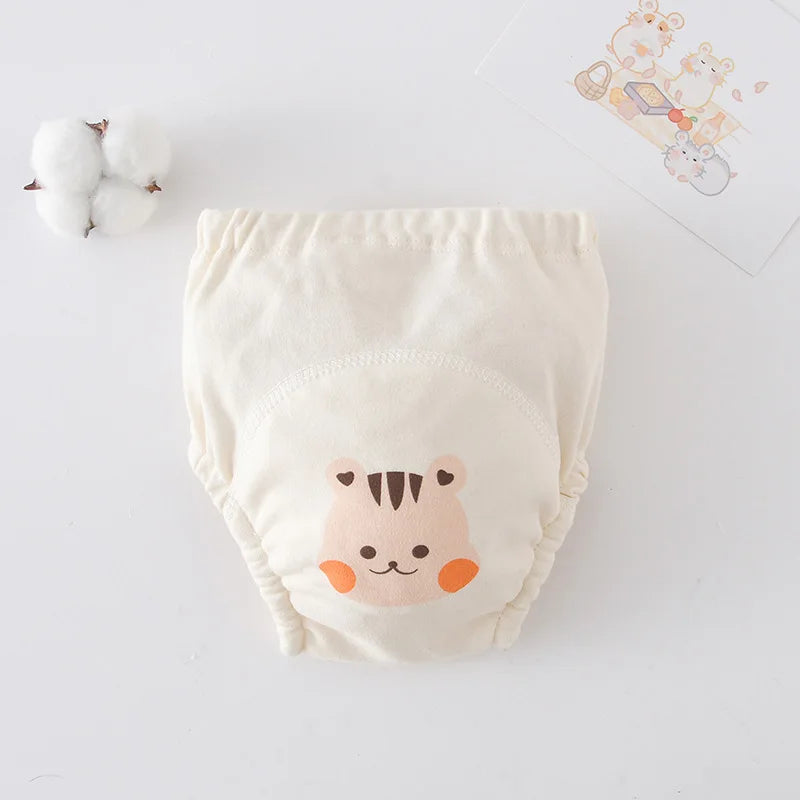 Reusable cotton baby training diaper with cute tiger print. Soft absorbent underwear for potty training toddlers.