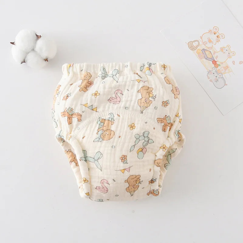 Cute muslin baby diaper cover with teddy bear, balloon animal, and swan print for gentle baby care.