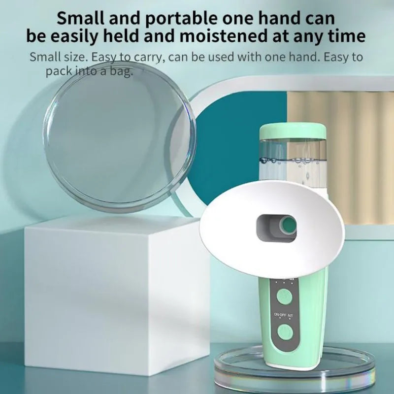 Portable green handheld eye misting device for hot and cold moisturizing eye care, USB rechargeable with eye cup.