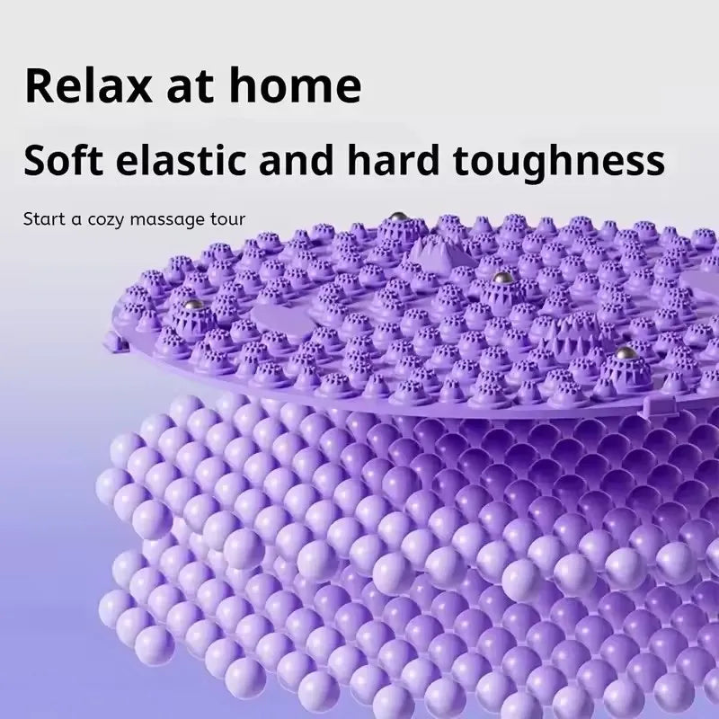 Purple acupressure foot massage pad with elastic textured base and metal beads for home reflexology and yoga training.
