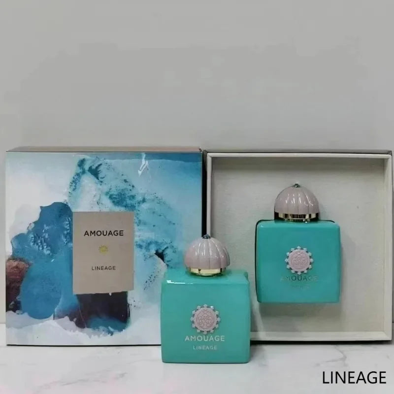 Amouage Lineage Eau de Parfum set with turquoise square glass bottles and dome caps in a luxury gift box.