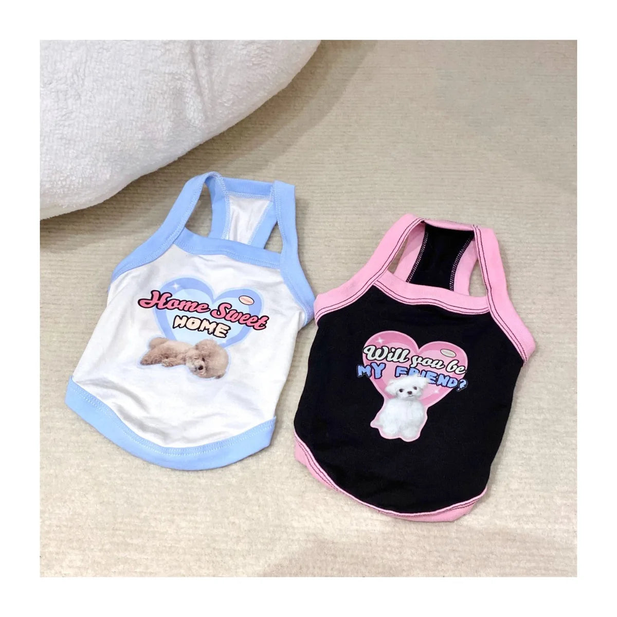 Cute dog camisole vests for small dogs in blue and black, featuring heart graphics. Comfortable spring puppy clothes.