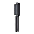 Black portable ceramic hair straightening brush with temperature controls for professional salon styling at home.