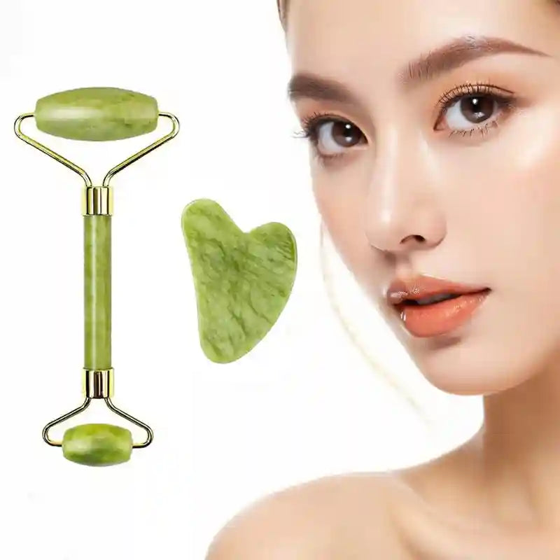 Green jade facial roller and heart-shaped gua sha tool shown next to a woman’s face.