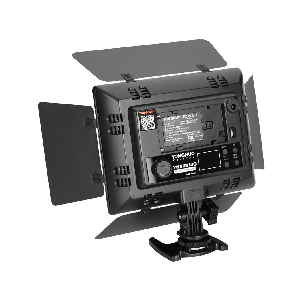 Black rectangular YN300 III LED video light with adjustable side barn doors and camera shoe mount.