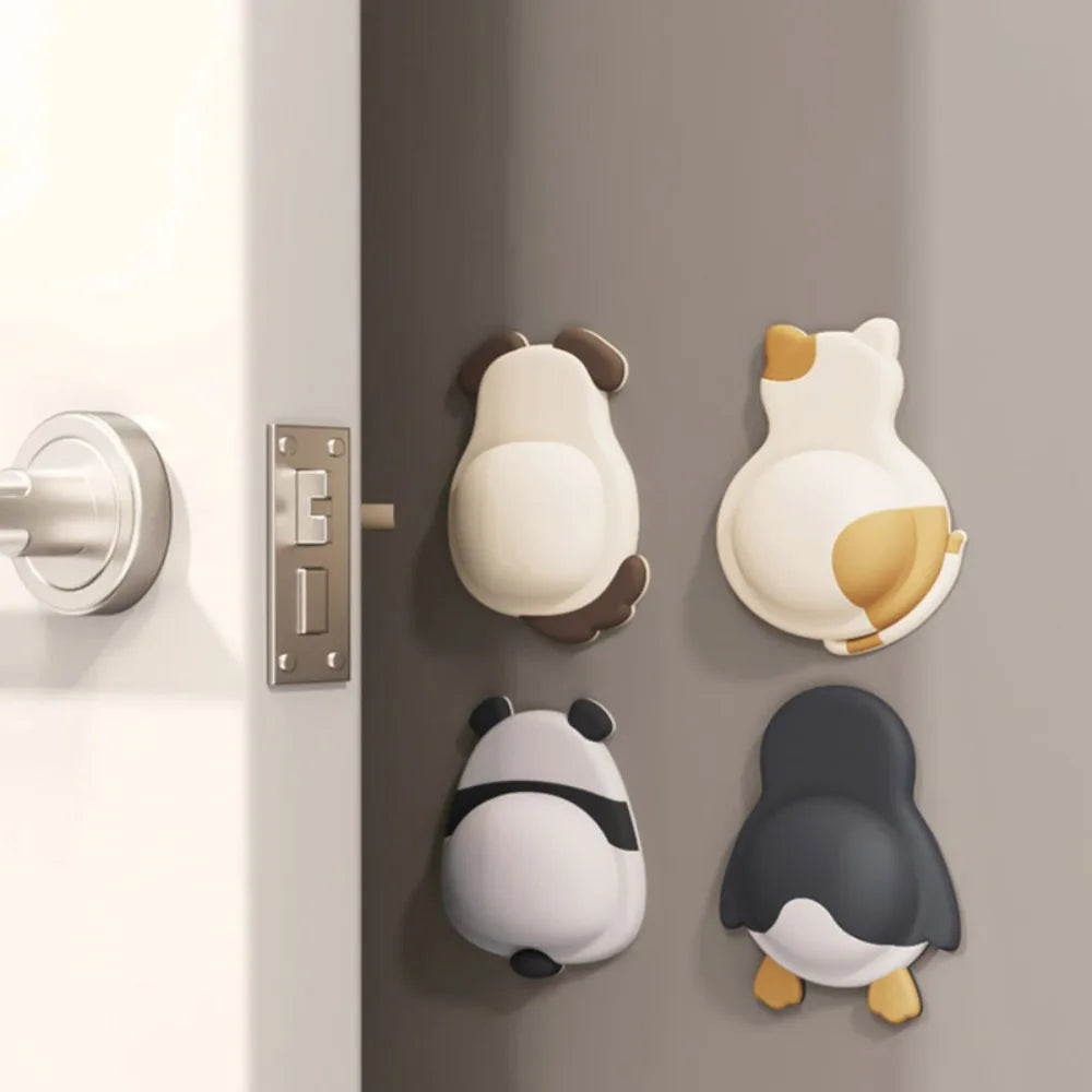 Self-adhesive 3D animal door stoppers for wall protection, featuring cute cat, dog, panda, and penguin designs.