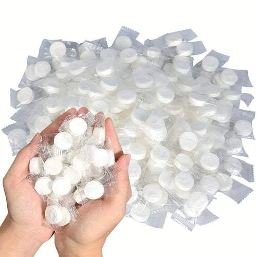 Bulk compressed baby care wipes, individual wrapped coin towels for gentle cleaning and baby skin care.