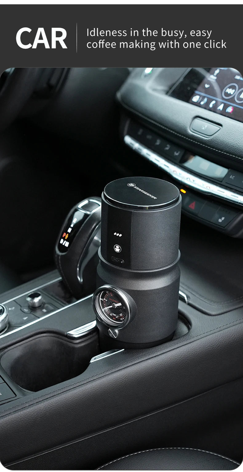 Starseeker portable black matte car coffee maker with pressure gauge in a vehicle cup holder.