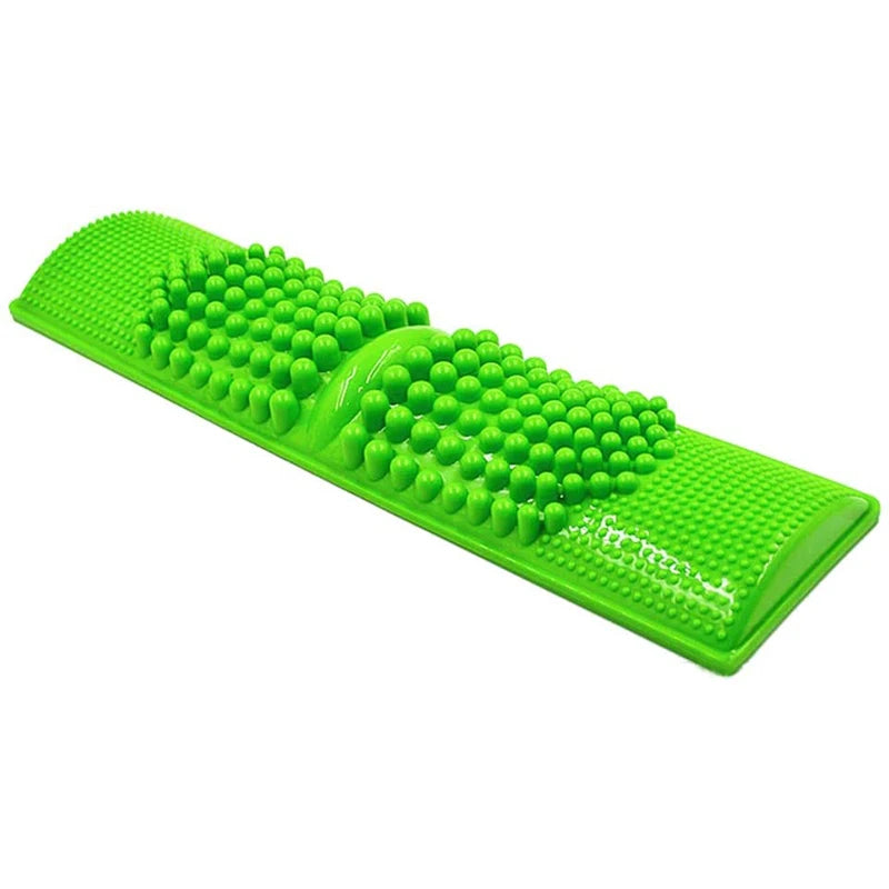 Green plastic foot reflexology massager mat with acupressure nodes for stress relief and home pain relief.