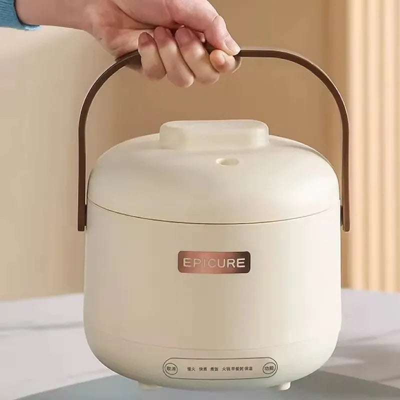 White electric rice cooker with raised lid handle and compact round body