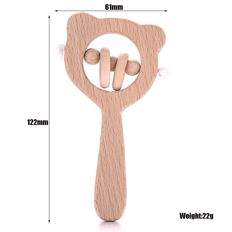 Natural wood baby teething rattle toy in light brown for soothing gum pain.