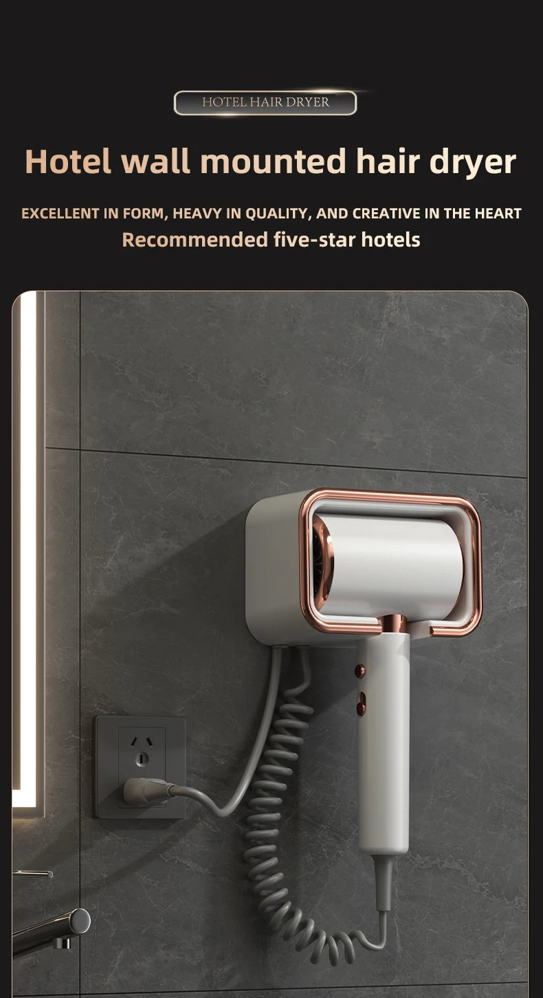 White and rose gold wall-mounted hair dryer with coiled cord and modern design for home or hotel bathroom use.