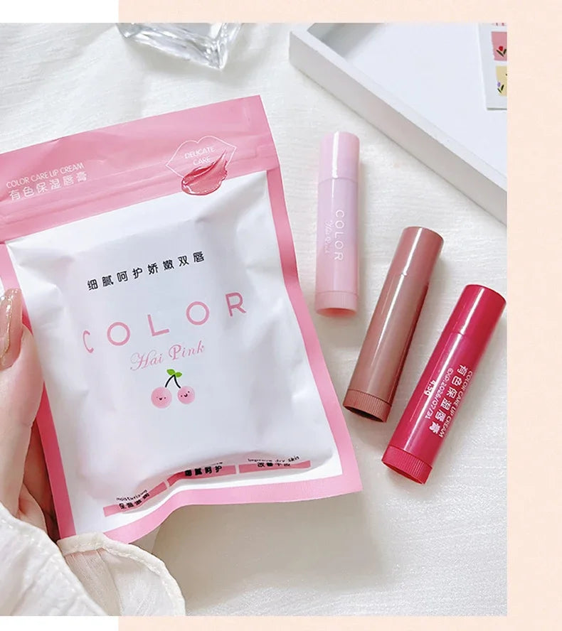 Cute moisturizing lip balm set in red and pink tints. Hydrating, anti-drying lip makeup to fade lip lines.