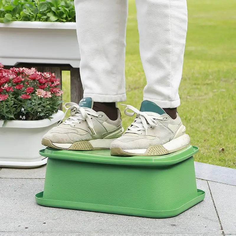 Green plastic planter base tray with perforated top insert