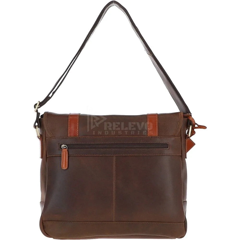Minimalist brown leather messenger handbag with adjustable strap, zippered pocket, and sleek designer travel style.