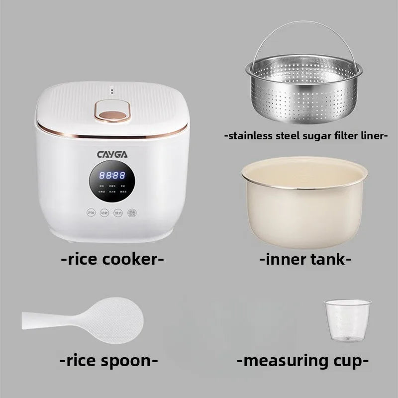 White rice cooker with accessories: stainless steamer basket, inner pot, rice spoon, cup