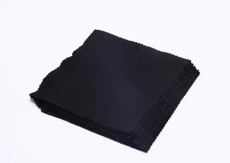 Square black microfiber cleaning cloth with pinked, zigzag edges for cleaning glasses and lenses.