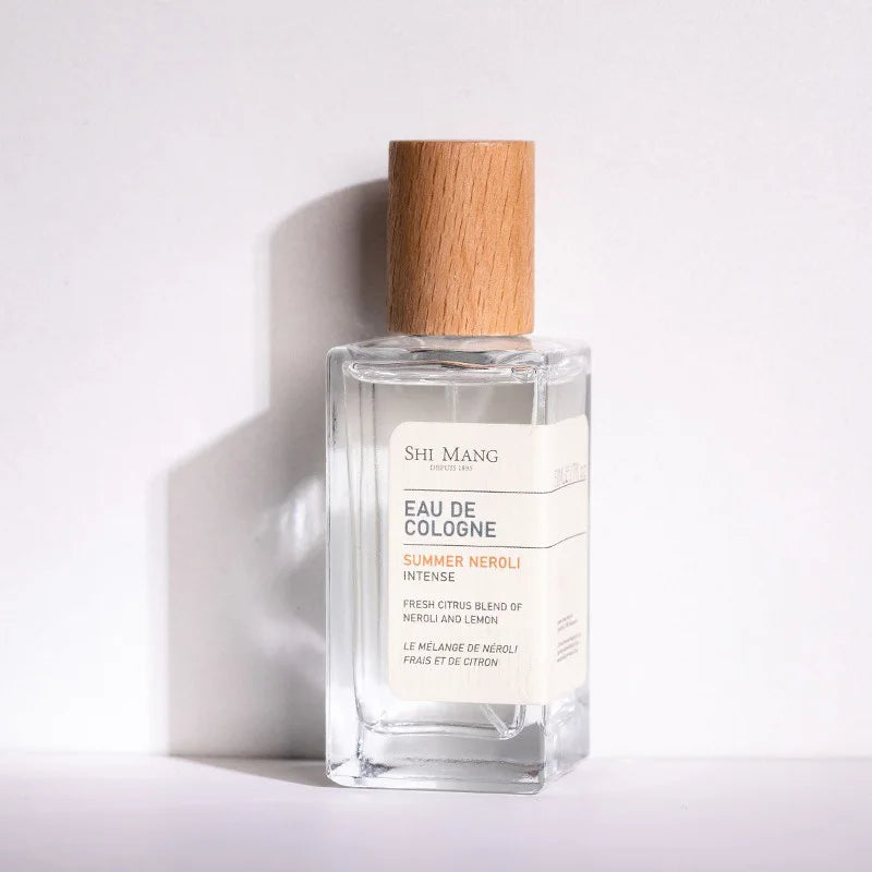 Shi Mang Summer Neroli Eau de Cologne: 50ml women’s citrus-neroli spray in a rectangular glass bottle with wood cap.