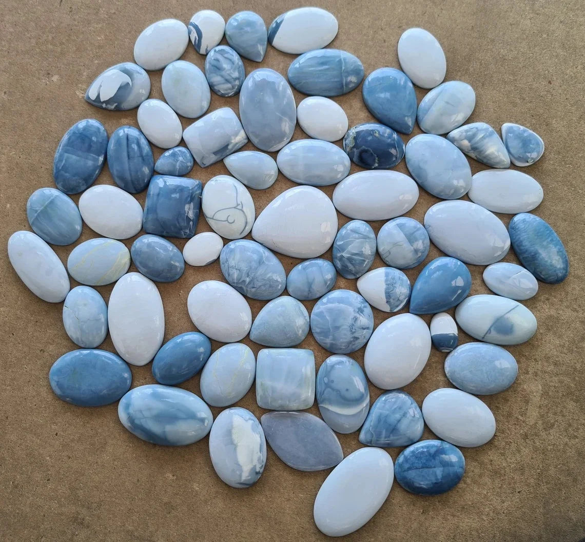Natural blue opal cabochon gemstones, oval and teardrop shapes, assorted sizes