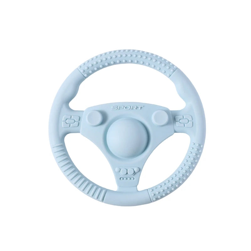 Light blue silicone steering wheel baby teething toy for soothing sore gums.