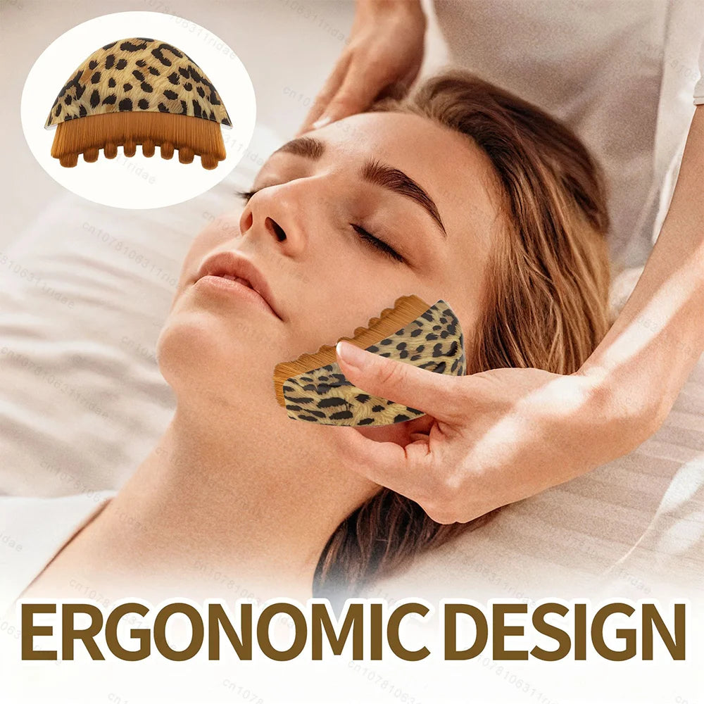 Leopard-print crescent-shaped facial massage brush with brown bristles, shown being used on a woman's jawline.