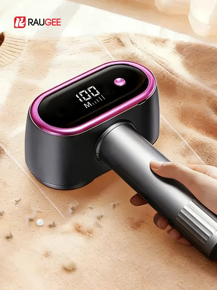Fabric shaver removes lint from a fuzzy sweater, showing its digital display and ergonomic handle.