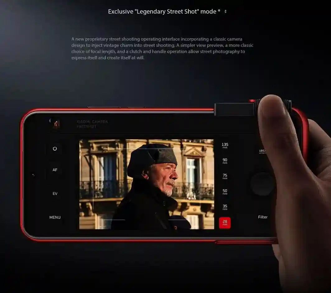 Red smartphone held horizontally in landscape mode, displaying a street photography interface with camera controls.